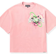 Pink t-shirt with graphic design and brand name on a white background