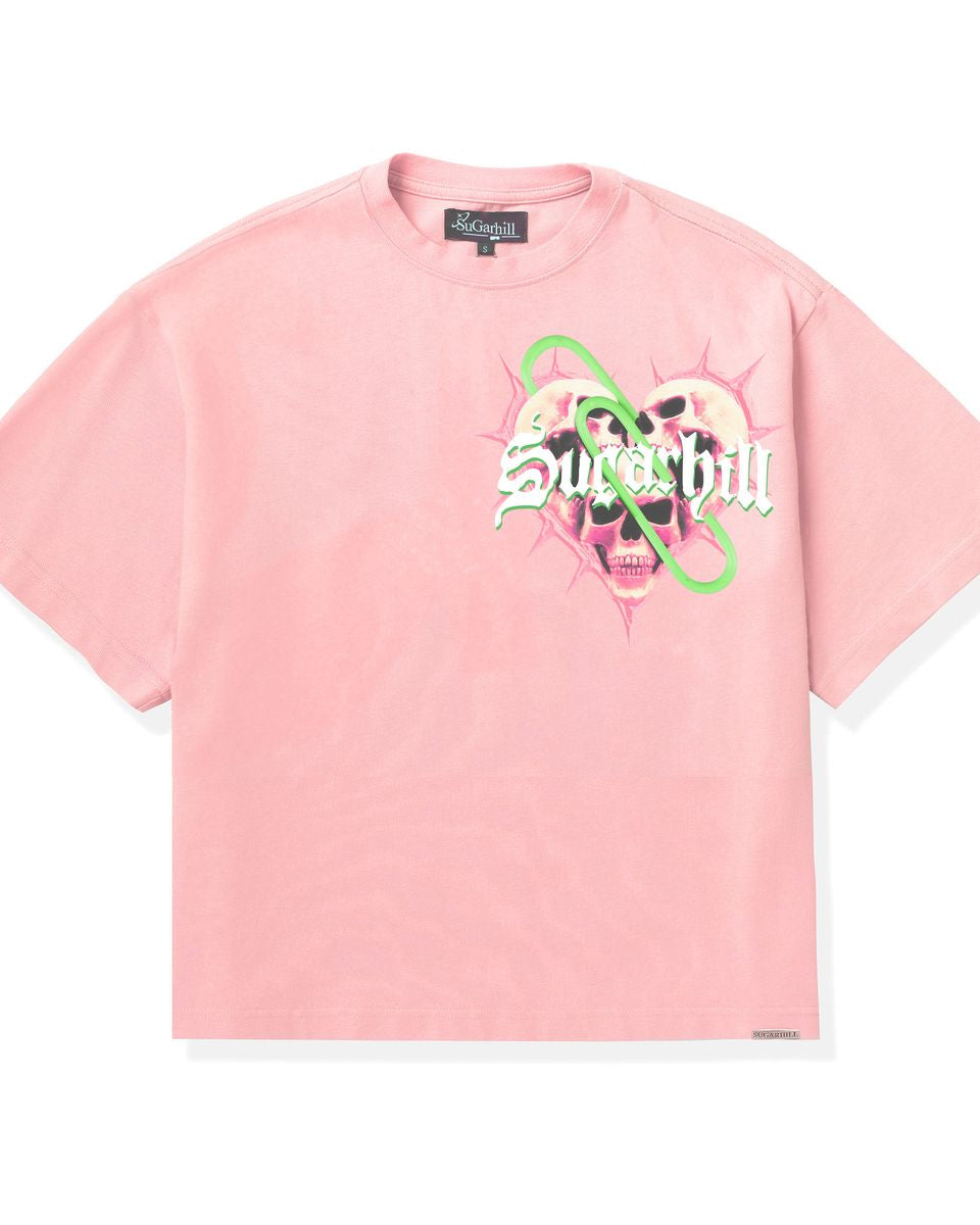 Pink t-shirt with graphic design and brand name on a white background