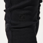 Close-up of a black garment on a white background