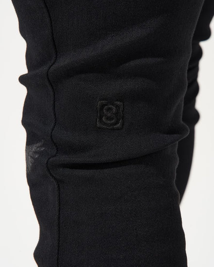 Close-up of a black garment on a white background