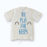 White shirt with blue text 'WE PLAY FOR KEEPS' on a white background