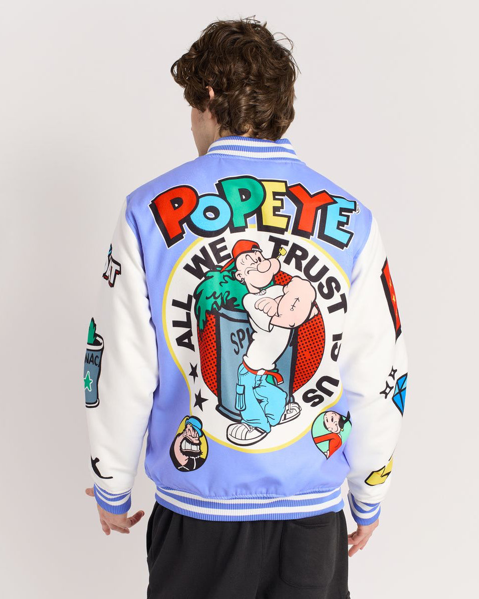 Person wearing a colorful 'Popeye' themed jacket with graphics on the back.