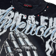 Black shirt with graphic design and text on a white background