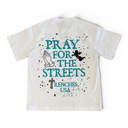 T-shirt with 'Pray for the Streets' text and graphics on a white background