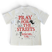 White t-shirt with red and black text and graphics on a white background