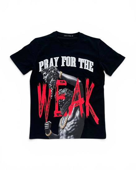 A black short-sleeve graphic t-shirt featuring a printed design of a man with gold chains and the text 'PRAY FOR THE WEAK' in white and distressed red lettering.