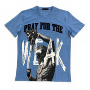 A blue short-sleeve graphic t-shirt featuring a black and white print of a muscular man with a chain-link mask and the text 'PRAY FOR THE WEAK' in black and white.