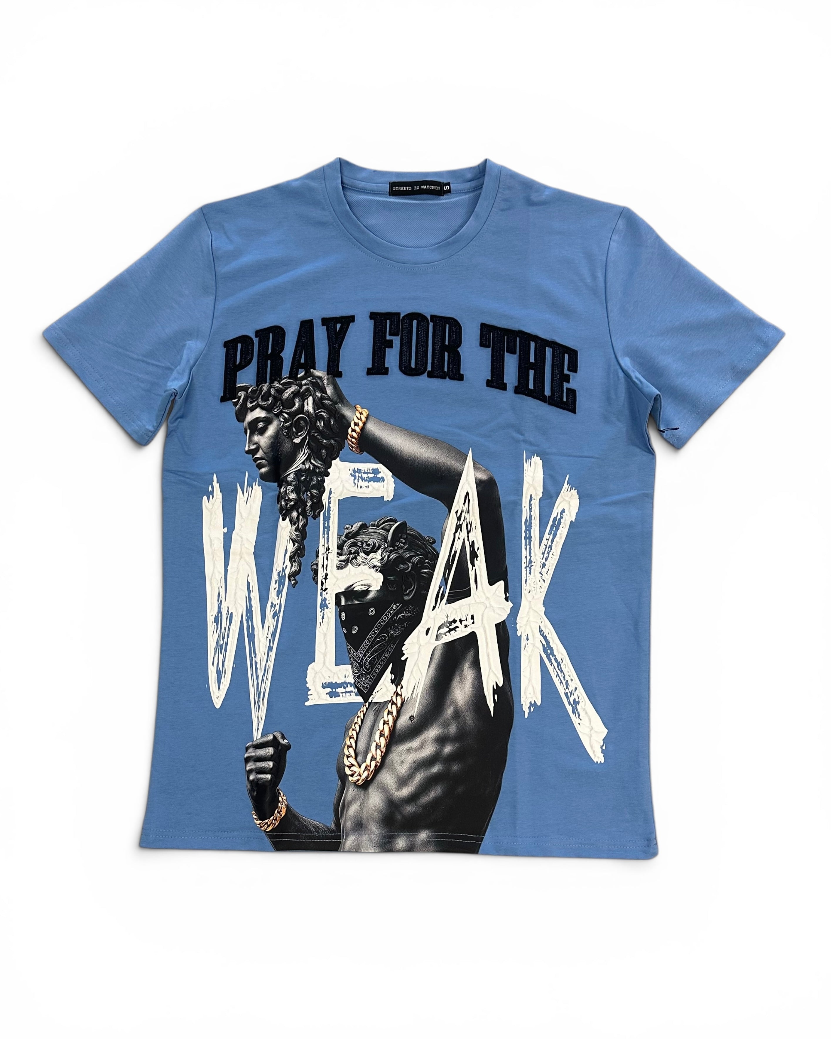 A blue short-sleeve graphic t-shirt featuring a black and white print of a muscular man with a chain-link mask and the text 'PRAY FOR THE WEAK' in black and white.