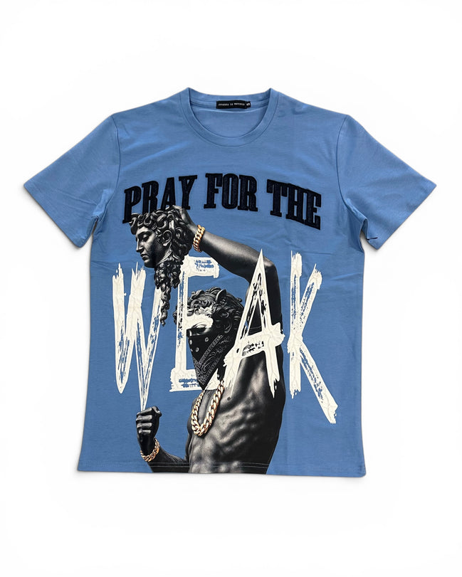 A blue short-sleeve graphic t-shirt featuring a black and white print of a muscular man with a chain-link mask and the text 'PRAY FOR THE WEAK' in black and white.