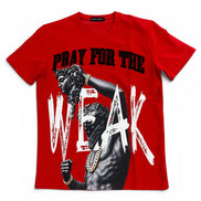 A red short-sleeve graphic t-shirt featuring a black and white print of a muscular statue with gold chains and the text 'PRAY FOR THE WEAK' in black and white distressed lettering.