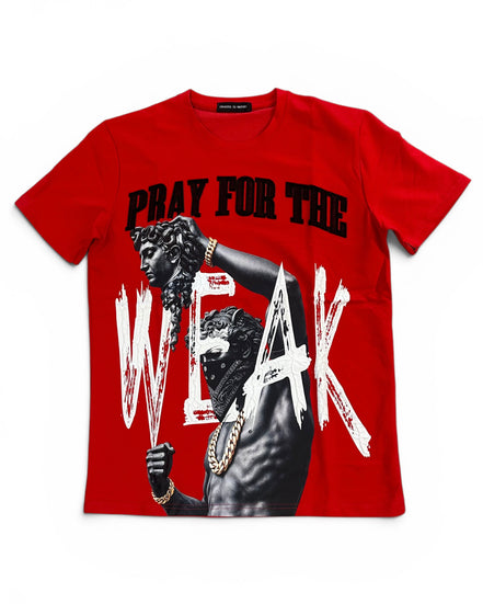 A red short-sleeve graphic t-shirt featuring a black and white print of a muscular statue with gold chains and the text 'PRAY FOR THE WEAK' in black and white distressed lettering.