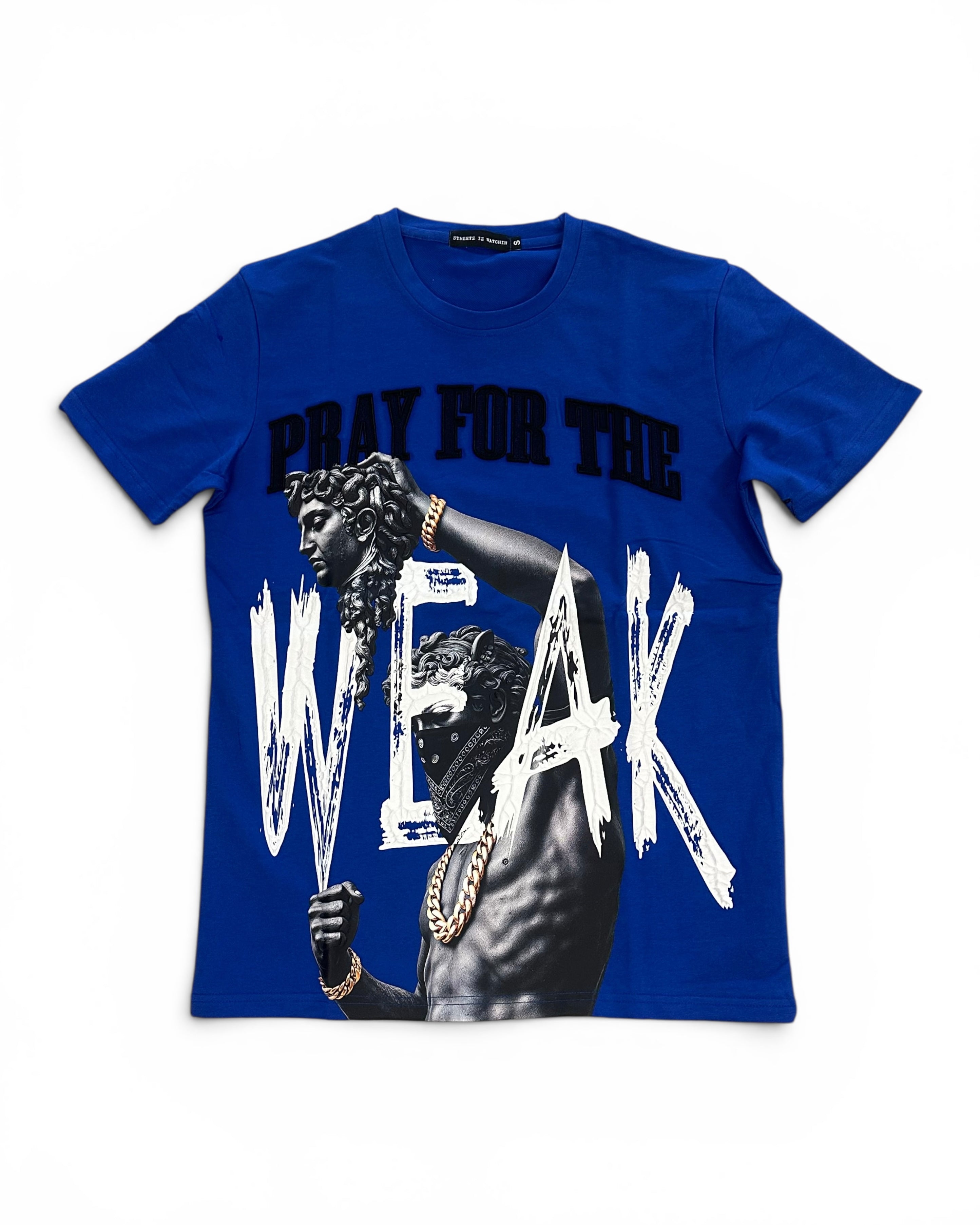 A royal blue short-sleeve graphic t-shirt featuring a printed design of a muscular statue with gold chains, the text 'PRAY FOR THE' in black, and 'WEAK' in large white brushstroke letters.