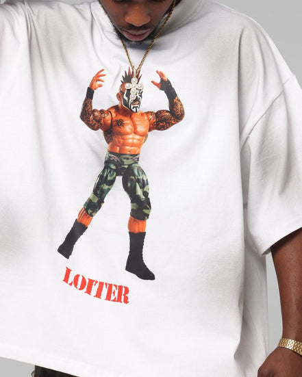 White t-shirt with graphic design of a muscular figure and 'LOITER' text, worn by a person.