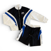 Cycling outfit with jacket and shorts on a white background