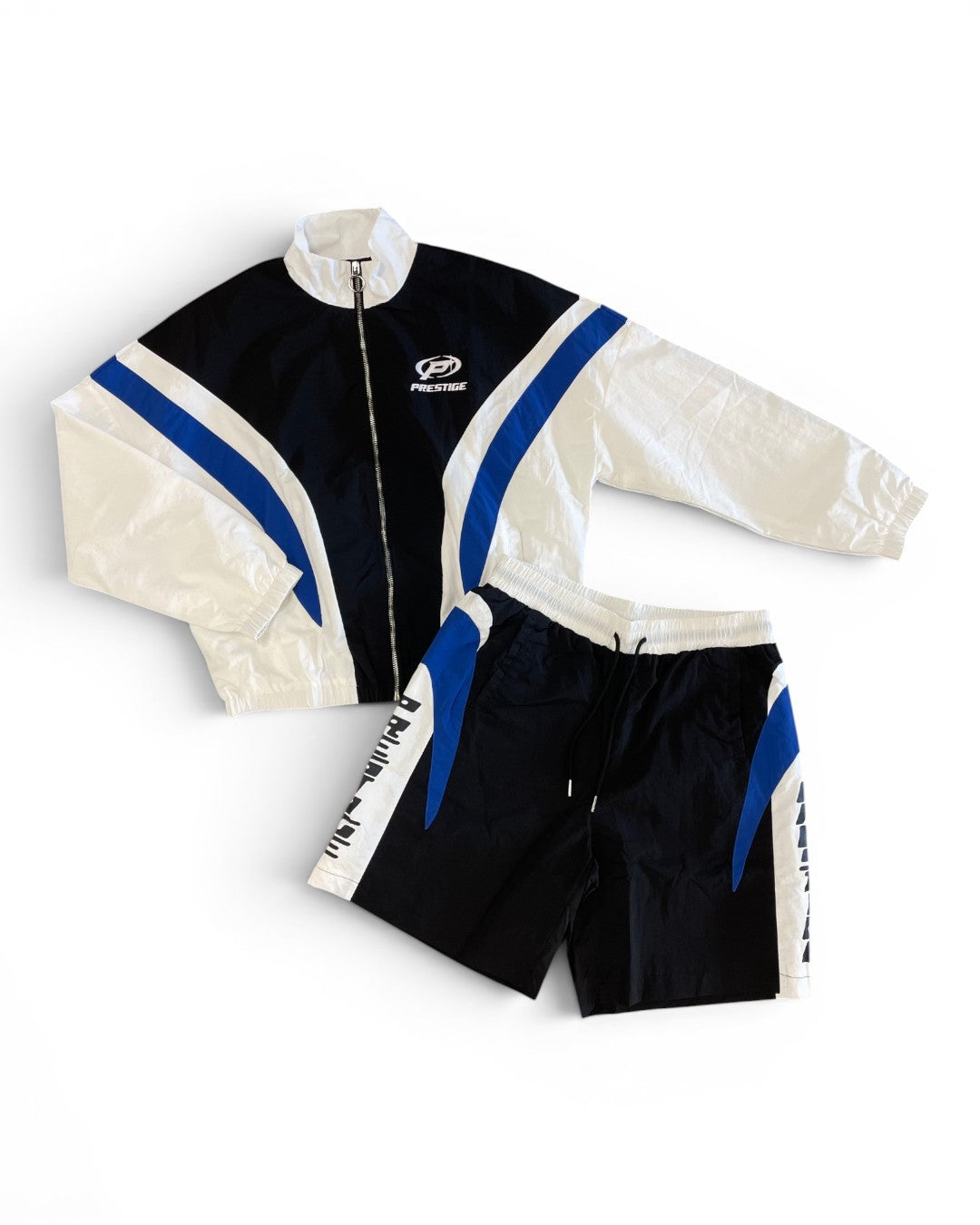 Cycling outfit with jacket and shorts on a white background