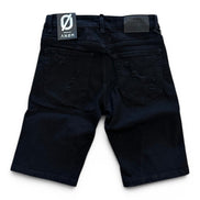 Black shorts with a brand label on a white background