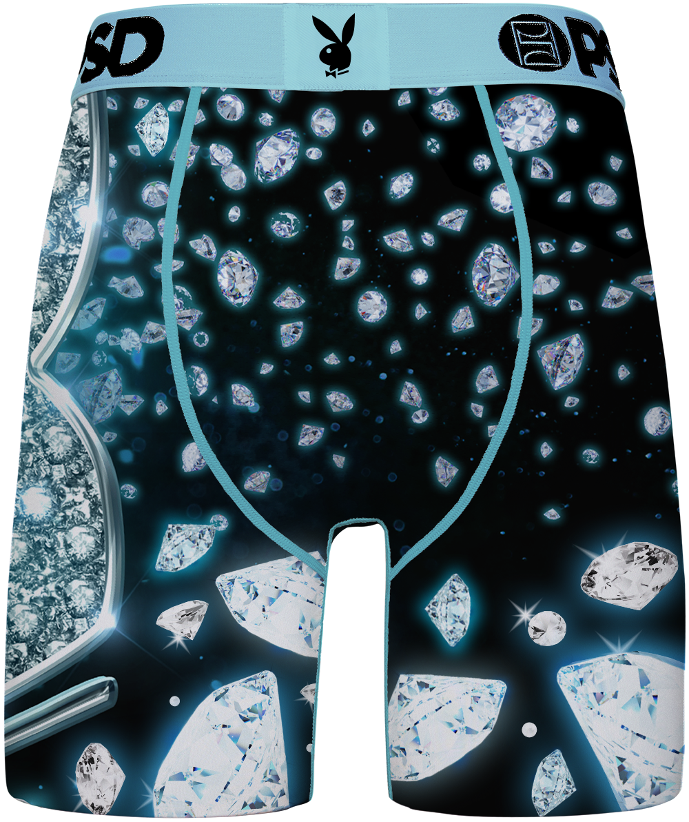Men's boxer briefs featuring a black background printed with glowing blue diamonds, a light blue elastic waistband with Playboy bunny logo and 'PSD' branding, and a textured icy blue pattern on the left leg.