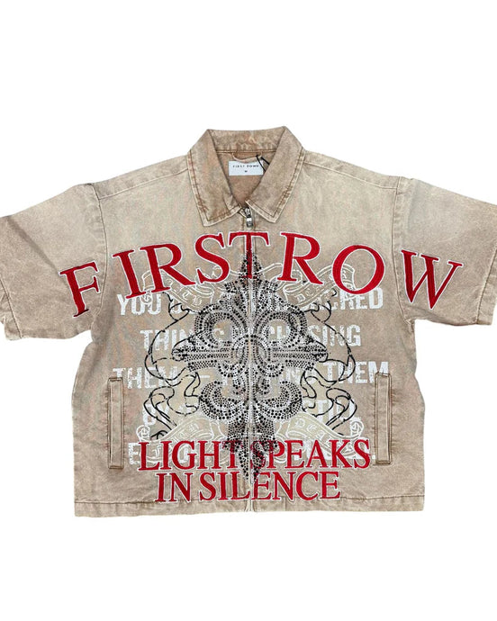 Beige shirt with red and black text and graphics on a white background