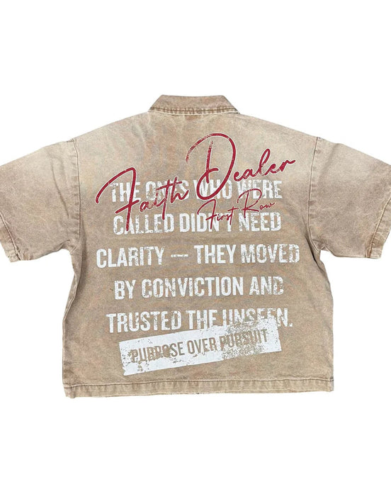 Beige denim shirt with text on the back on a white background