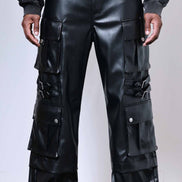 Black leather cargo pants worn by a person on a plain background