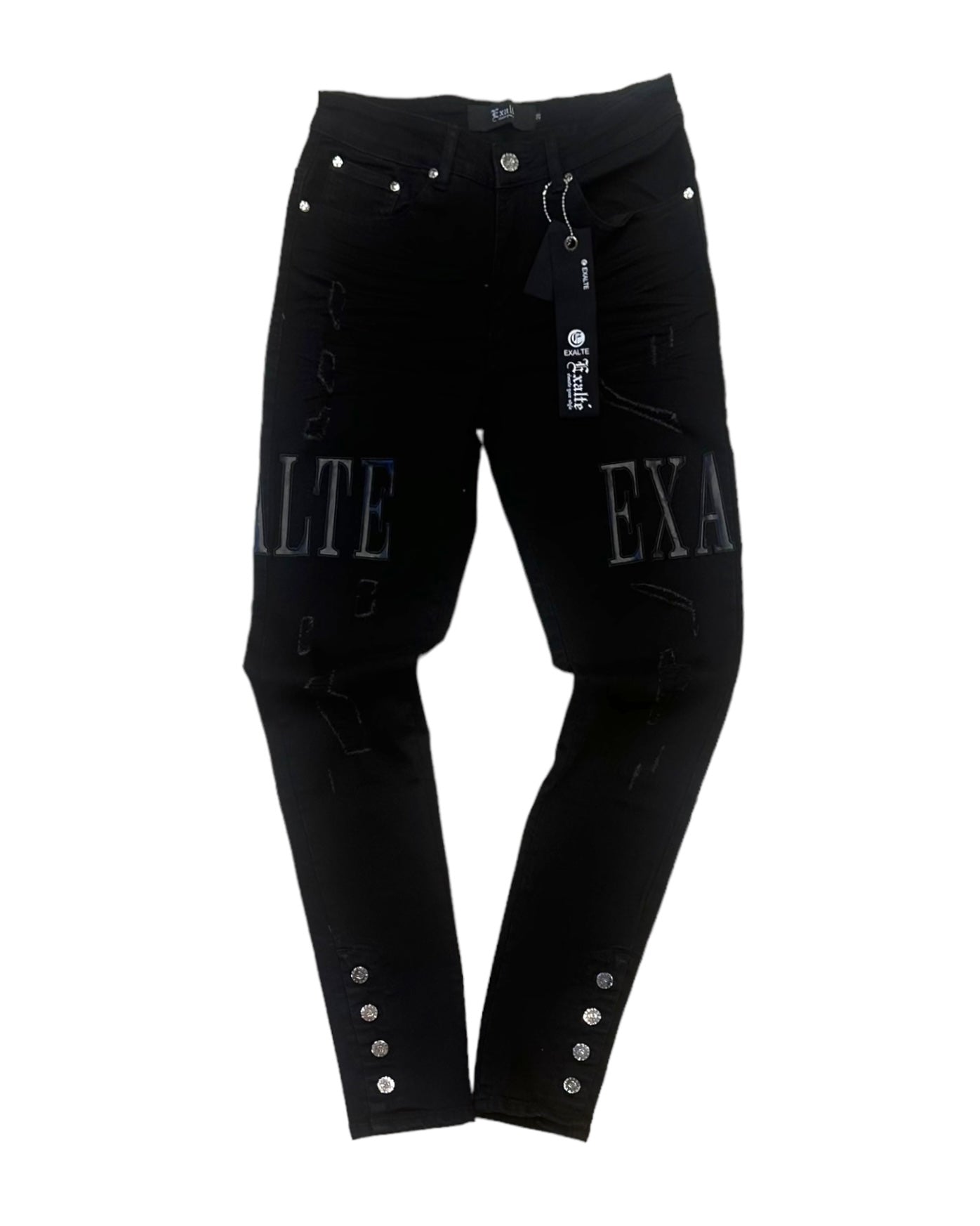 front view of the black exlate jeans with the leather patches gleaming. You can see lightly distressed rips and the buttons at the bottom. 