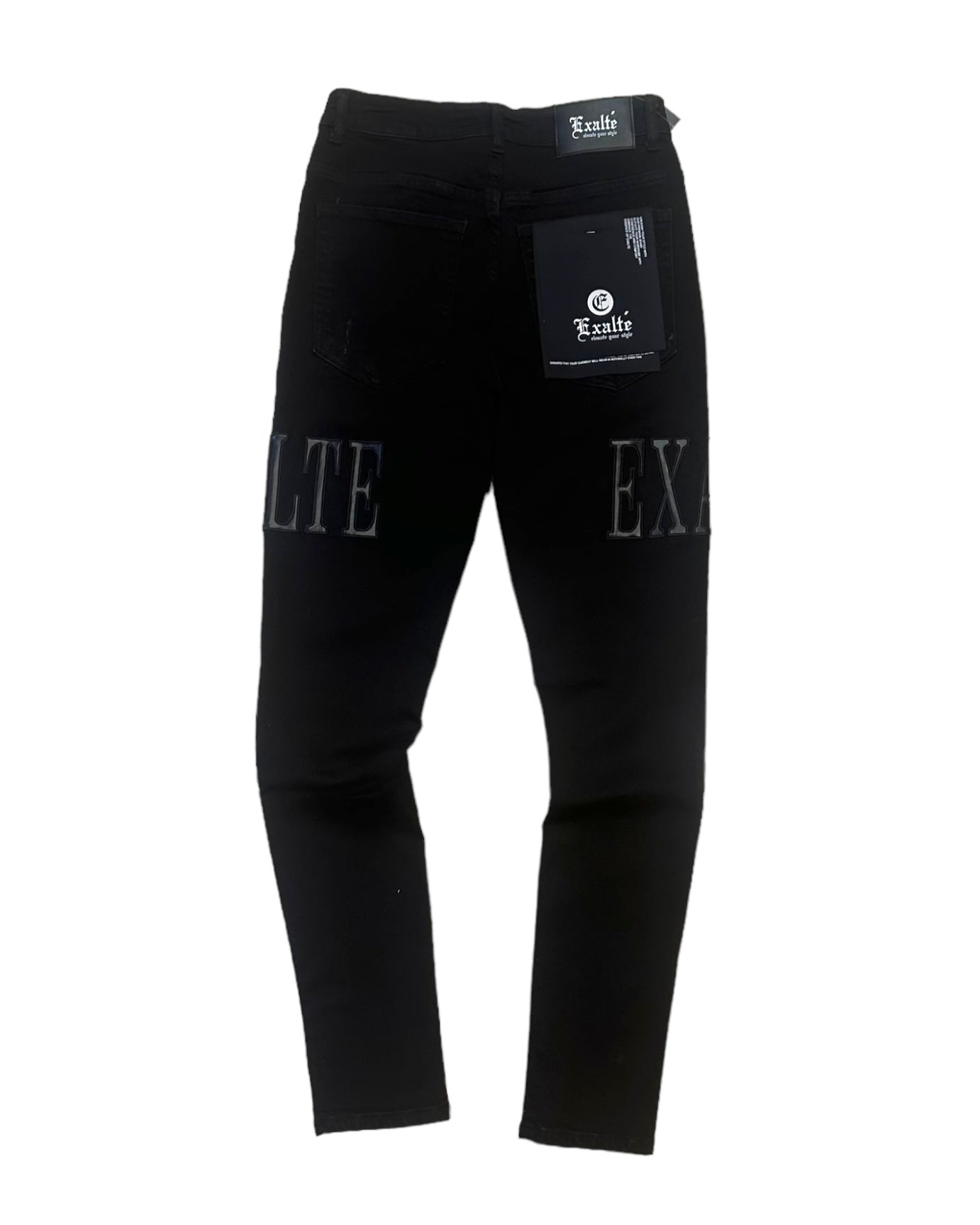 back view of the black exlate jeans with the leather patches gleaming.