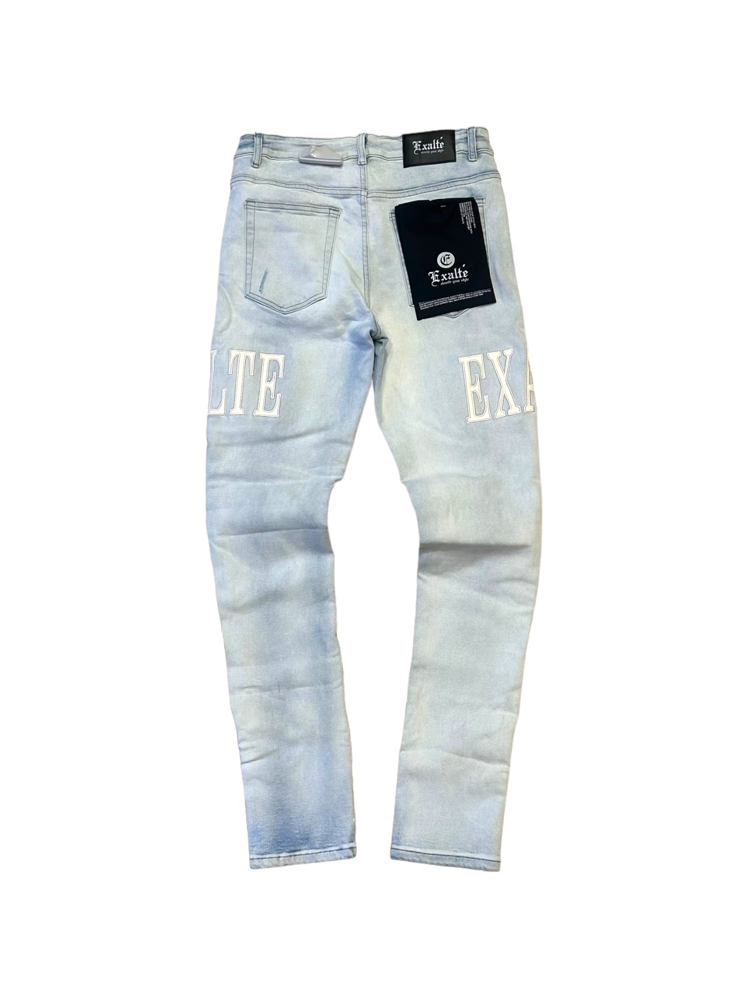 back view of the ice blue exlate jeans with the leather patches gleaming. 