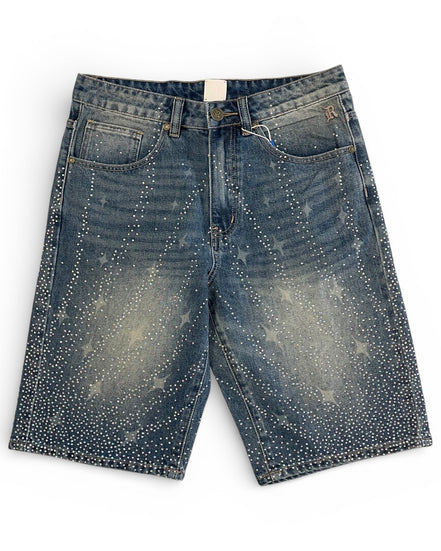Distressed denim shorts on a white background