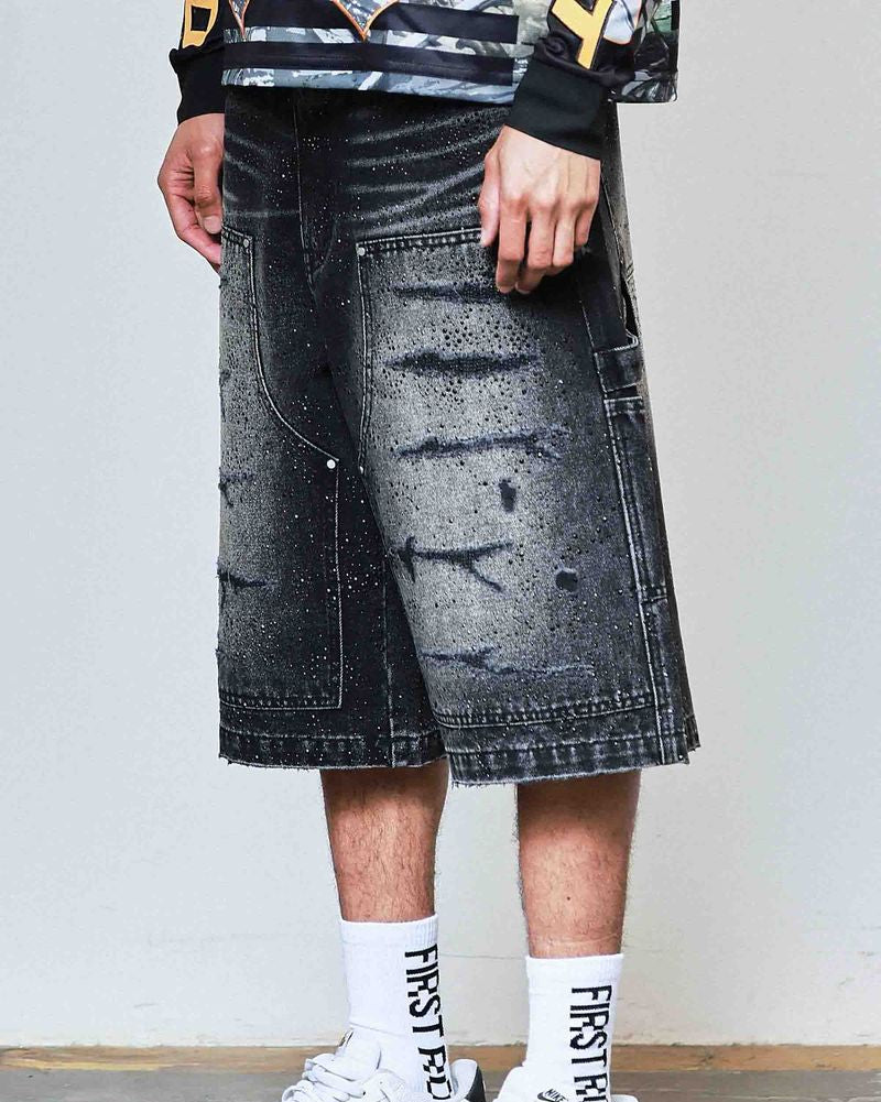 Person wearing a black and white outfit with a denim skirt, Nike shoes, and socks with text.