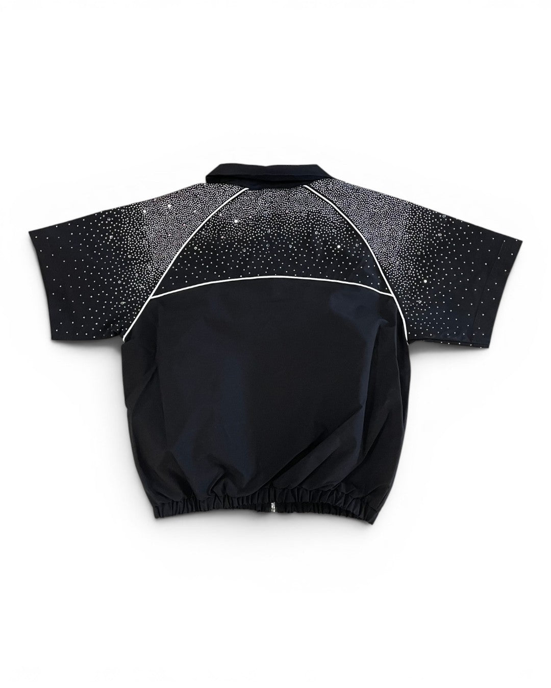 Black shirt with star pattern on sleeves against a white background