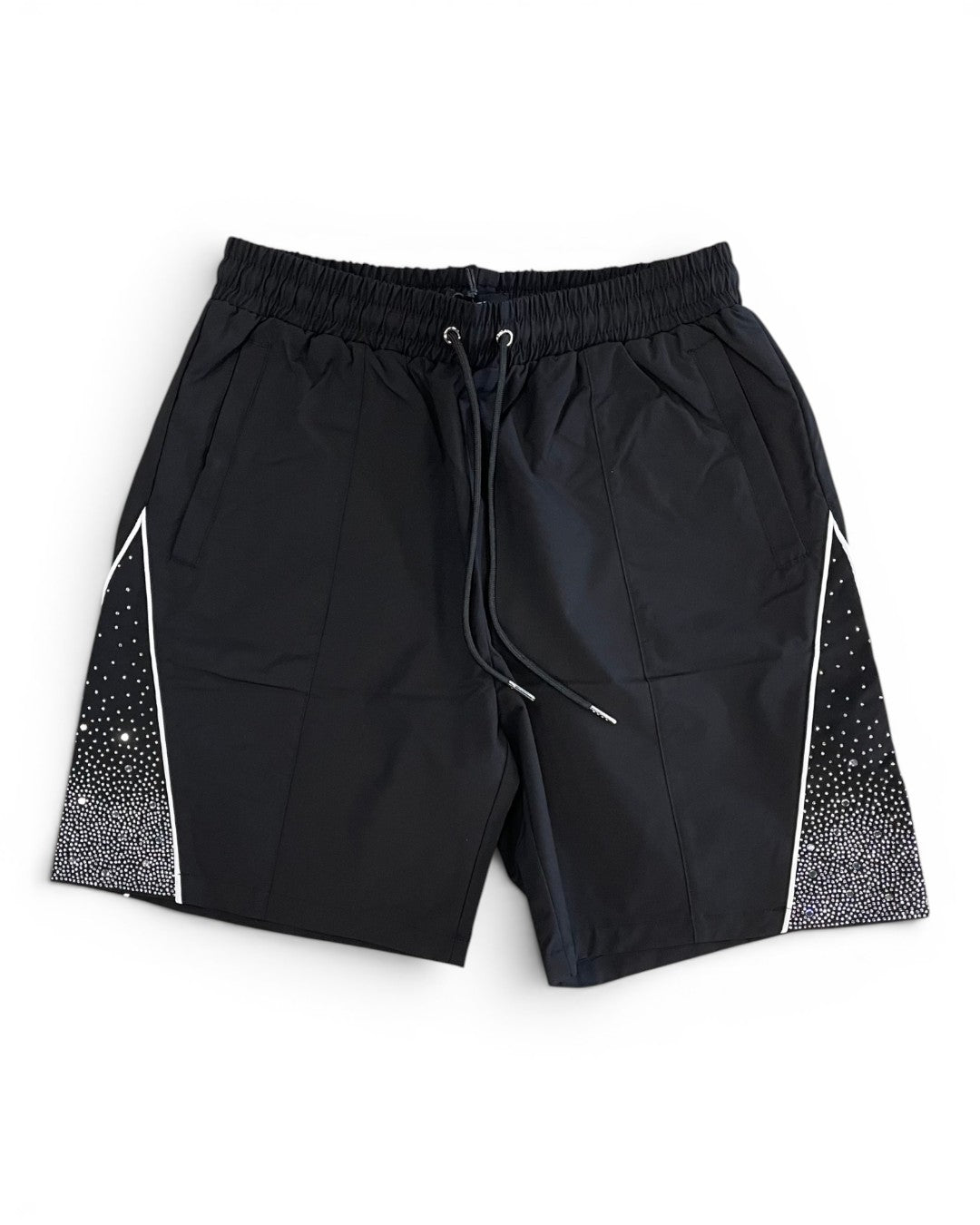 Black shorts with white geometric patterns on a white background