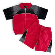 Red and black children's jacket and shorts set on a white background