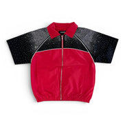 Red jacket with black speckled sleeves on a white background