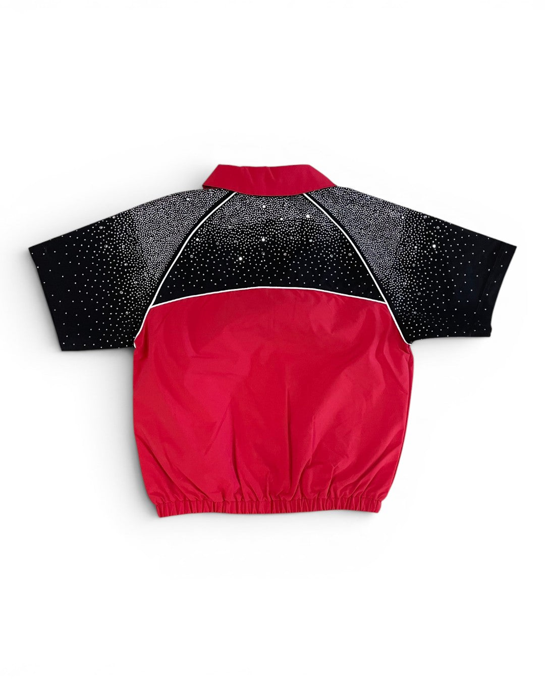 Red and black jacket with star pattern on a white background