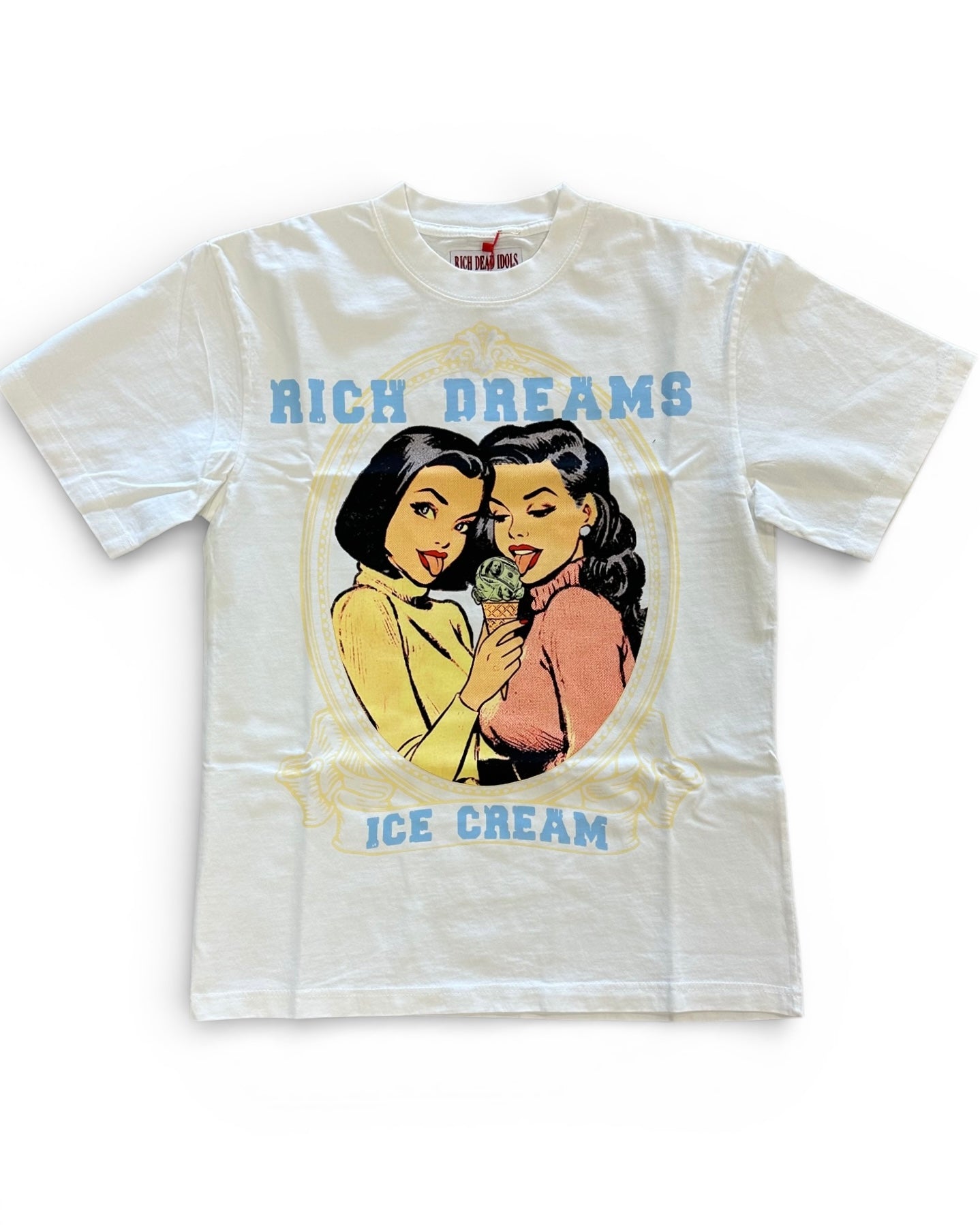 White t-shirt with graphic design of two people with ice cream and text 'Rich Dreams Ice Cream' on a white background