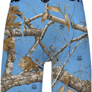 Men's boxer briefs featuring a Realtree Edge camouflage pattern of tree branches and oak leaves on a light blue background, with a matching waistband.