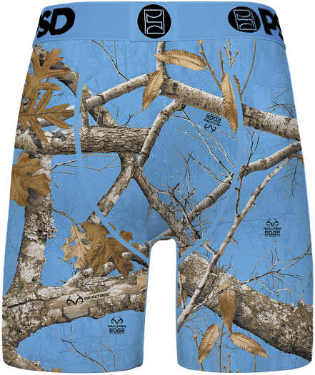Men's boxer briefs featuring a Realtree Edge camouflage pattern of tree branches and oak leaves on a light blue background, with a matching waistband.