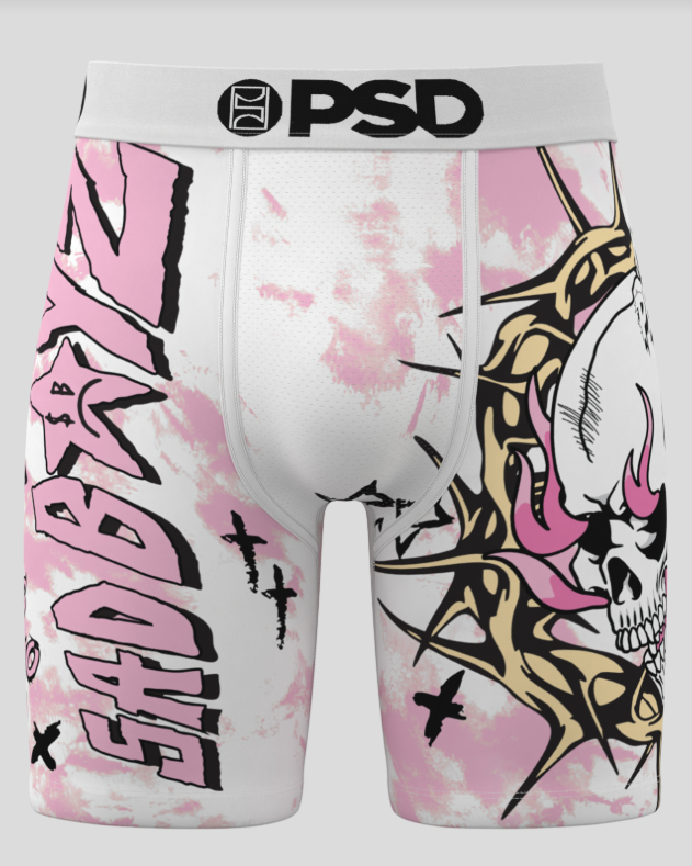 Pink and white boxer briefs with black and gold designs and 'PSD' branding on a white background.