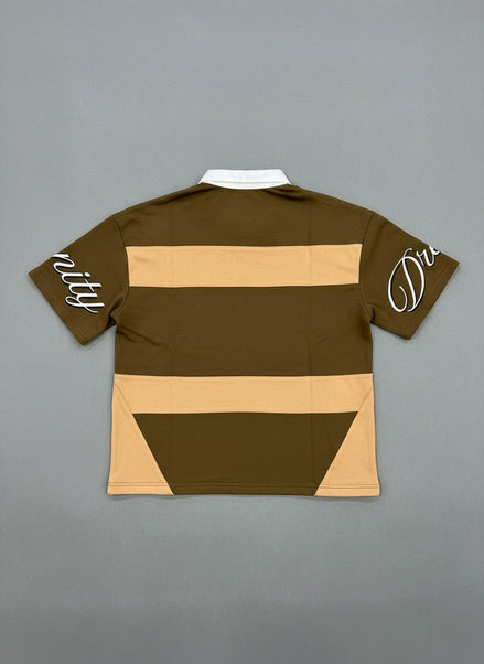 Brown and beige striped shirt with branding on a gray background