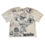 Beige t-shirt with graphic designs and text on a white background