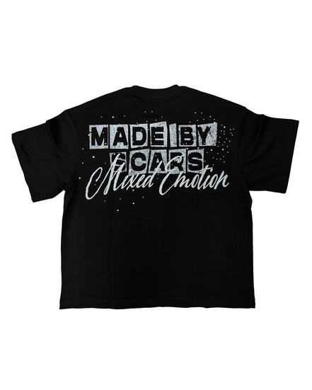 black t-shirt with rhinestone details and phrase "made by scars mixed emotions". 