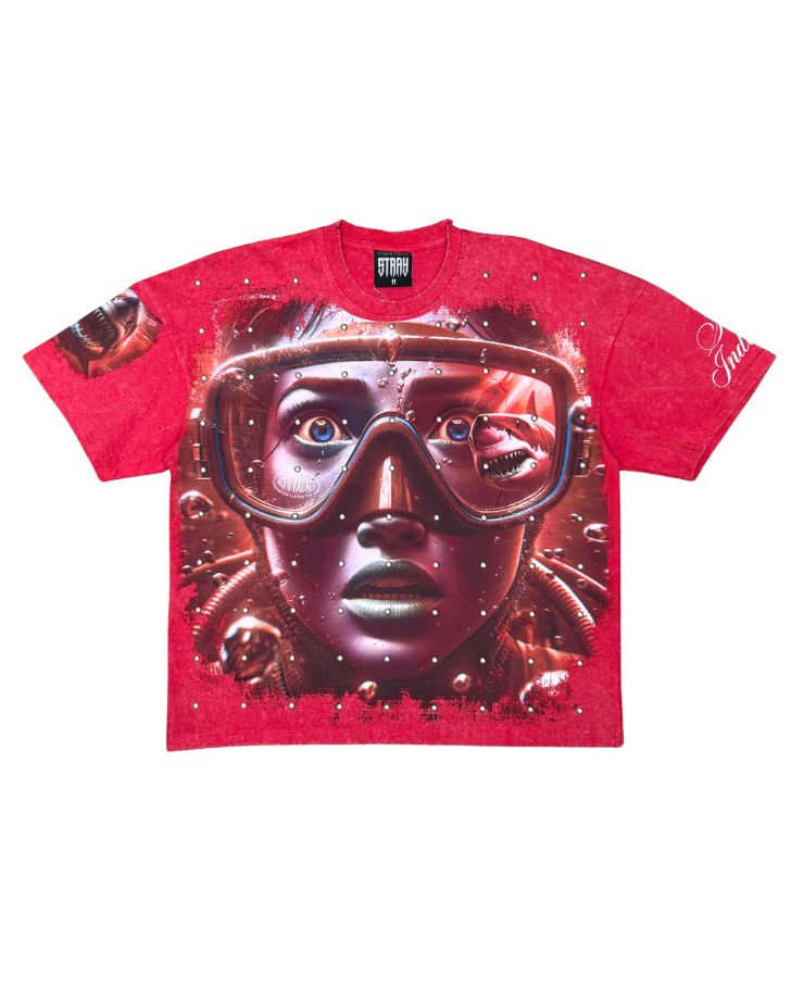 Red t-shirt with a graphic design of a face wearing goggles on a white background