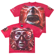 Red t-shirt with a shark and diver graphic design on a white background