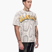 Man wearing a snake print t-shirt with text on a white background