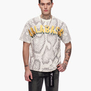 Man wearing a snake print t-shirt with text on a white background