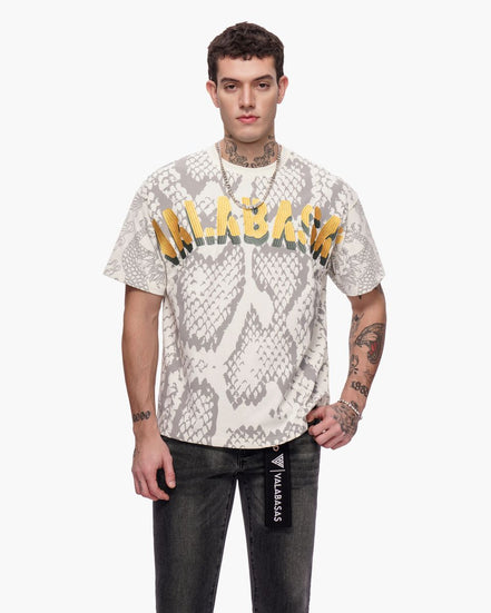 Man wearing a snake print t-shirt with text on a white background