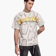 Man wearing a snake print t-shirt with 'Valabasas' branding on a white background