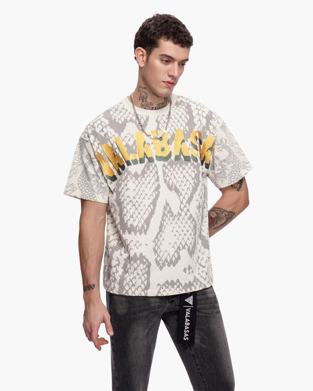 Man wearing a snake print t-shirt with 'Valabasas' branding on a white background