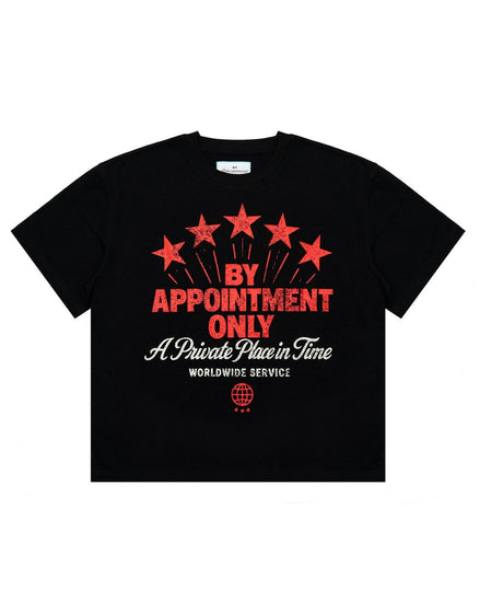 Black t-shirt with red and white text and graphics on a white background