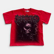 Red t-shirt with black graphic design on a white background